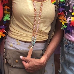 Beautiful long beaded necklace with tassel